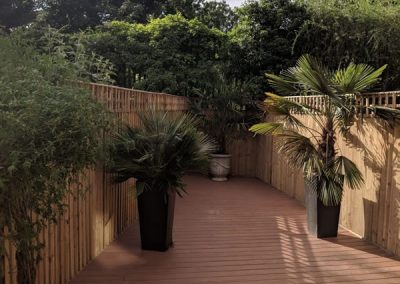 New Fence and Tiki Torch Trex Decking in Buckinghamshire