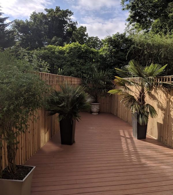 New Fence and Tiki Torch Trex Decking in Buckinghamshire